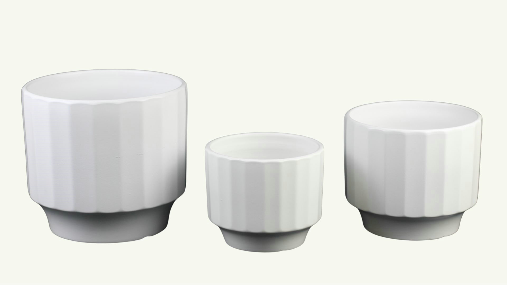 Large floor planter beside armchair